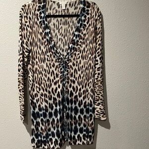Chico's multi-colored Animal Print Knit Cardigan. Long sleeved button front
SZ 2